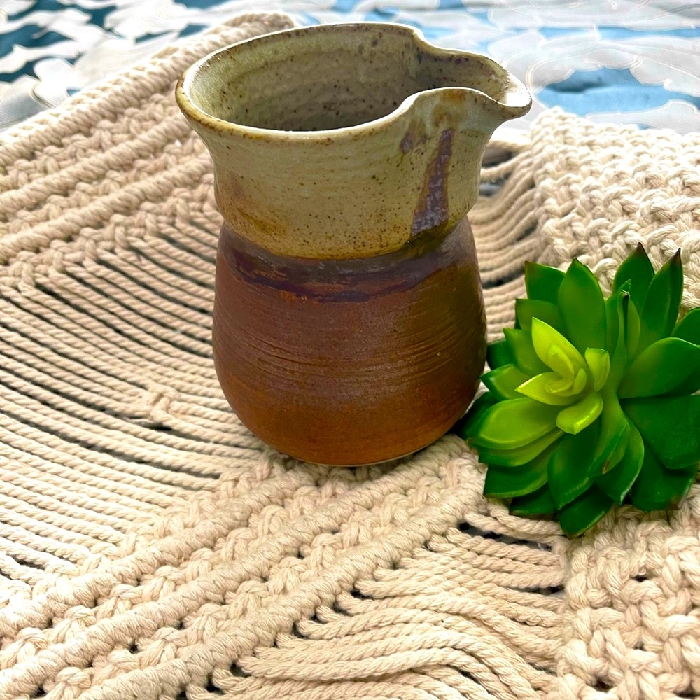 Art pottery creamer. Signed Earth Tones